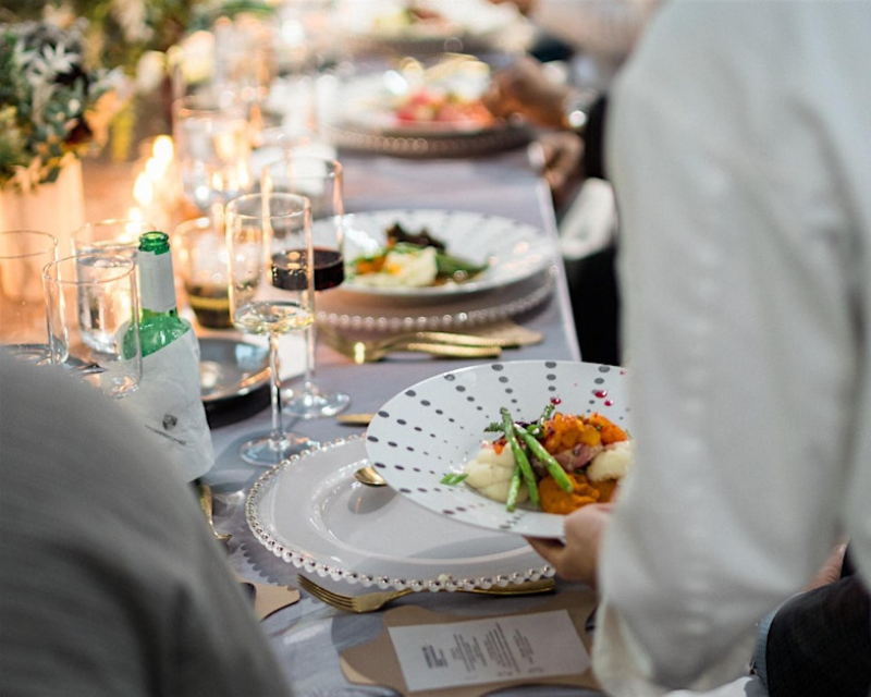 formal dinner with plate and wine glasses