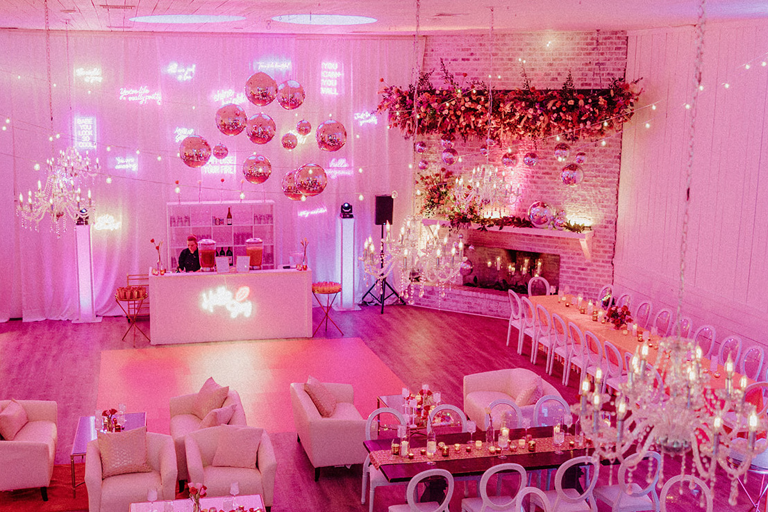 Gracie Ballroom glowing pink and decorated for a Valentine's themed event