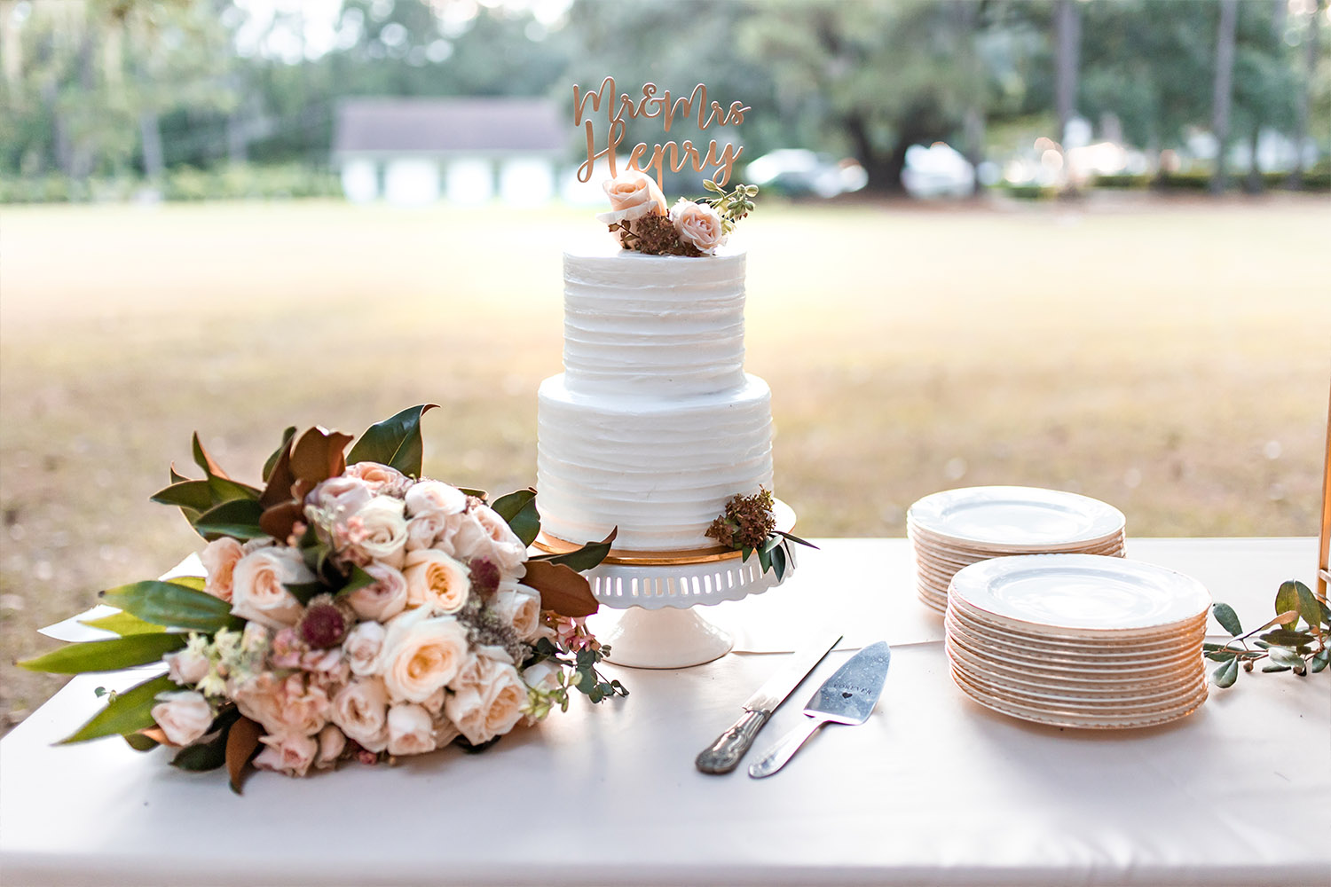 Wedding bouquet beside the wedding cake