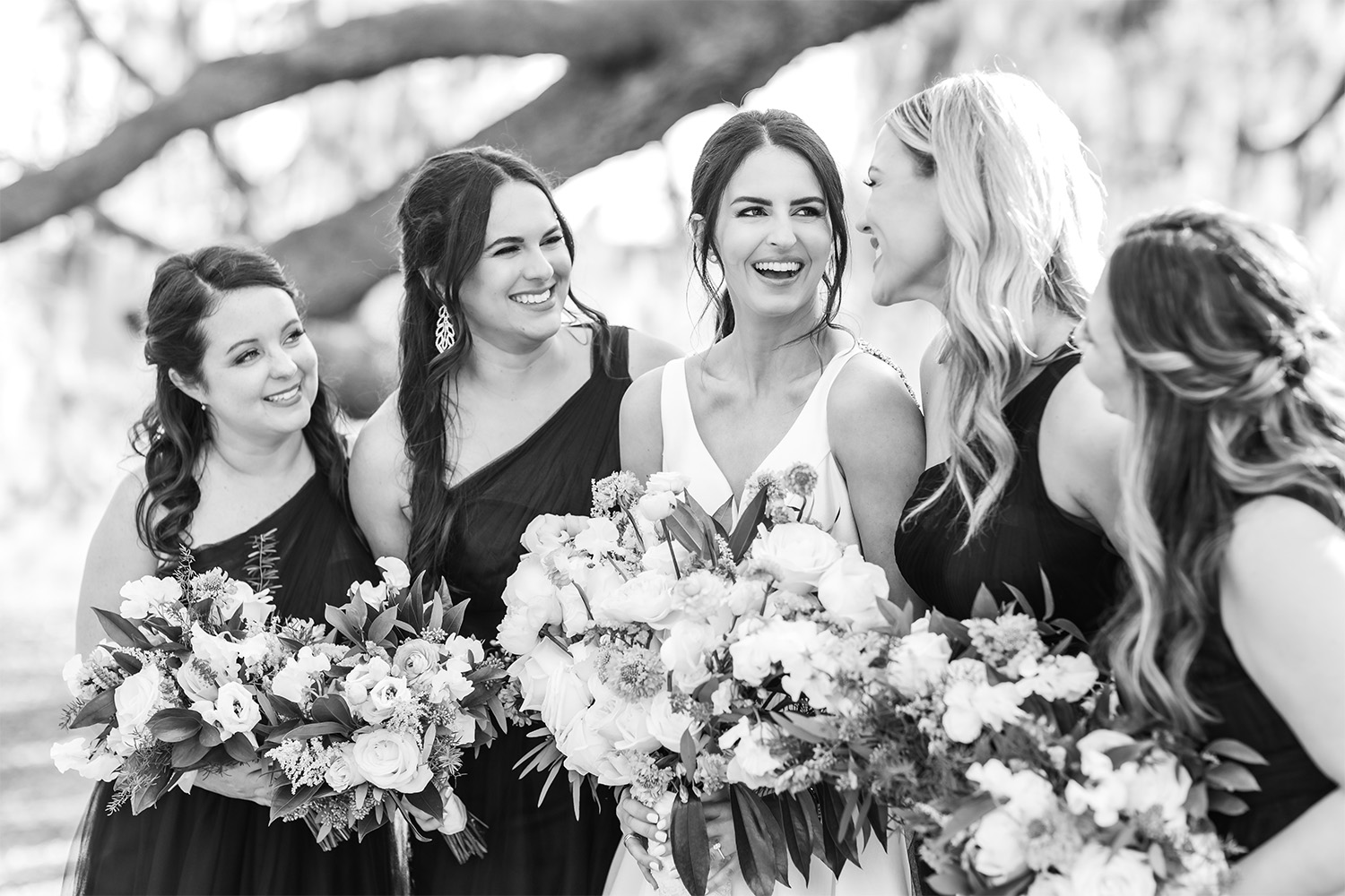 Black and white image of bride and her bridesmaids