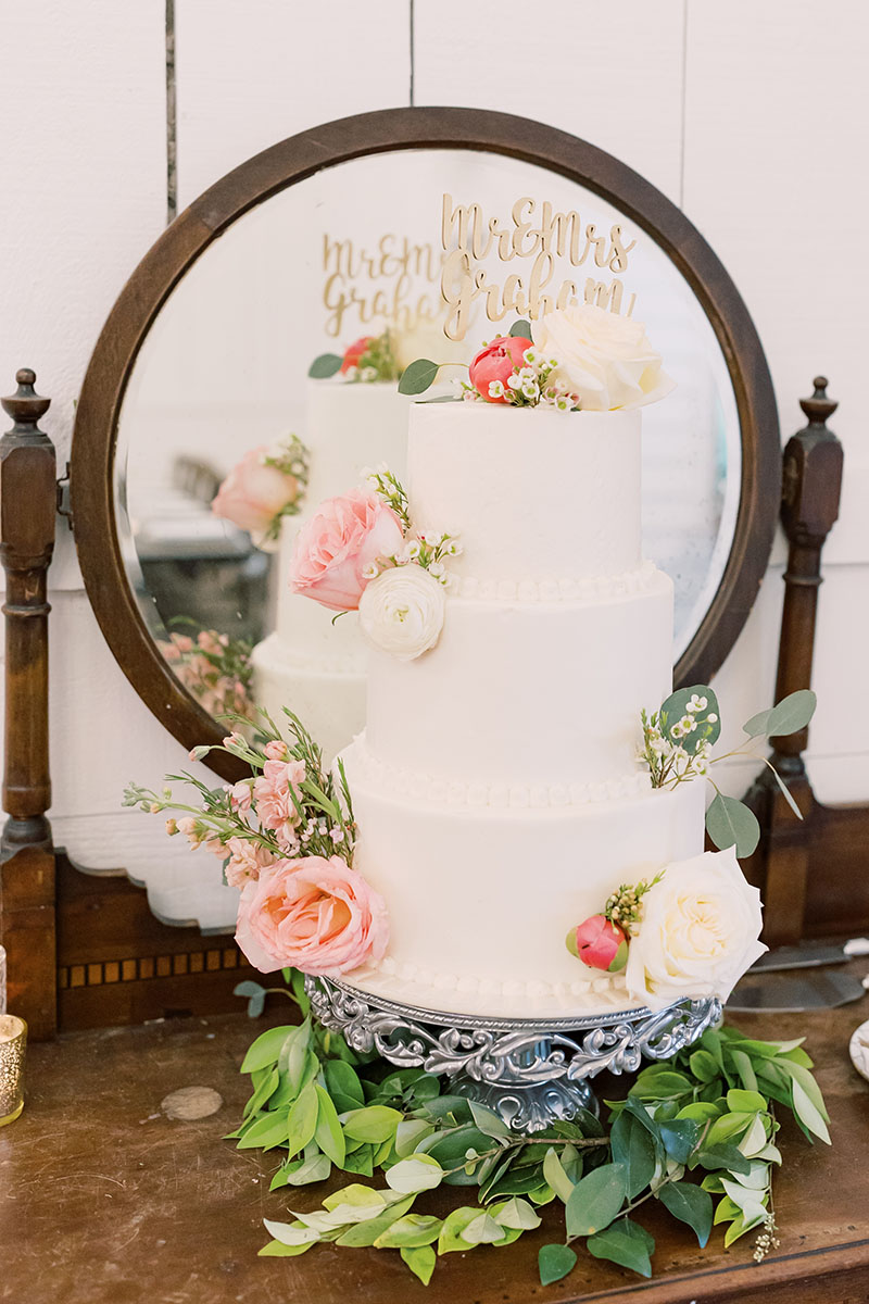 3-tier wedding cake with pink and white florals
