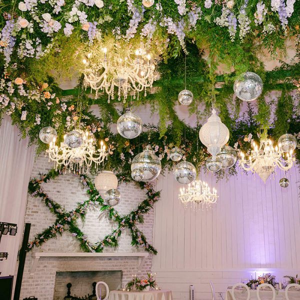 Ceiling chandeliers with floral decorations.