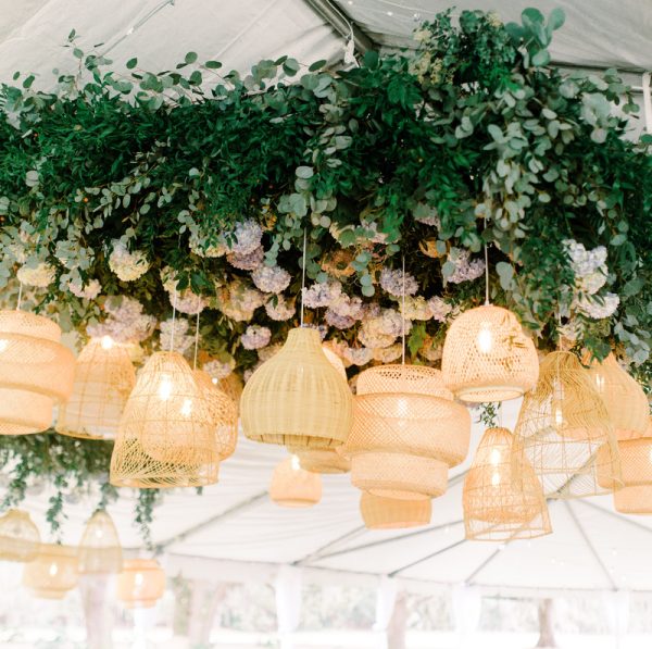 Rattan lanterns, natural greens and hydrangea suspended over a dance floor