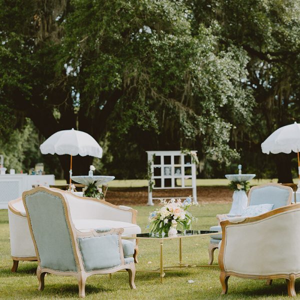 An inviting outdoor lounge set in an open space.